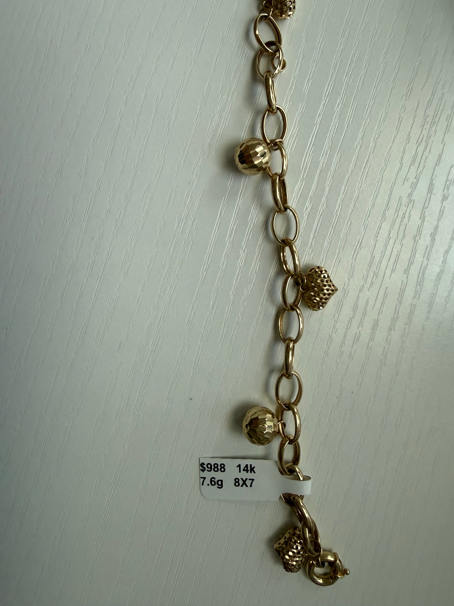 Brazalete de 14 k con colgante