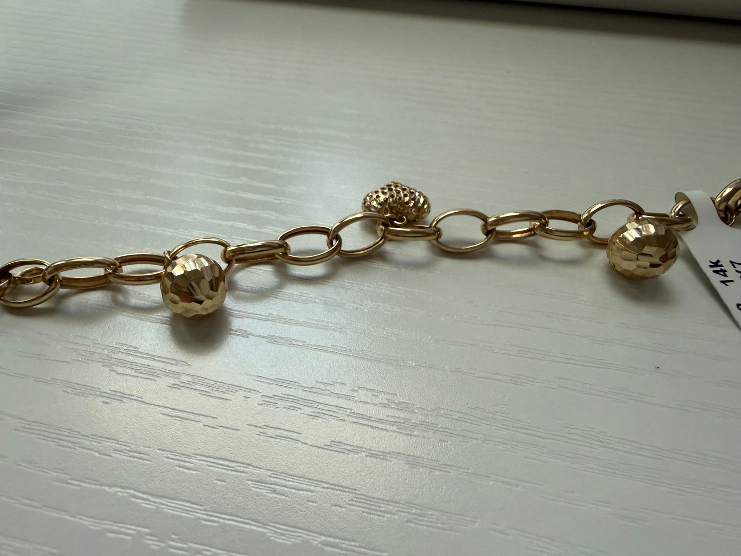 Brazalete de 14 k con colgante