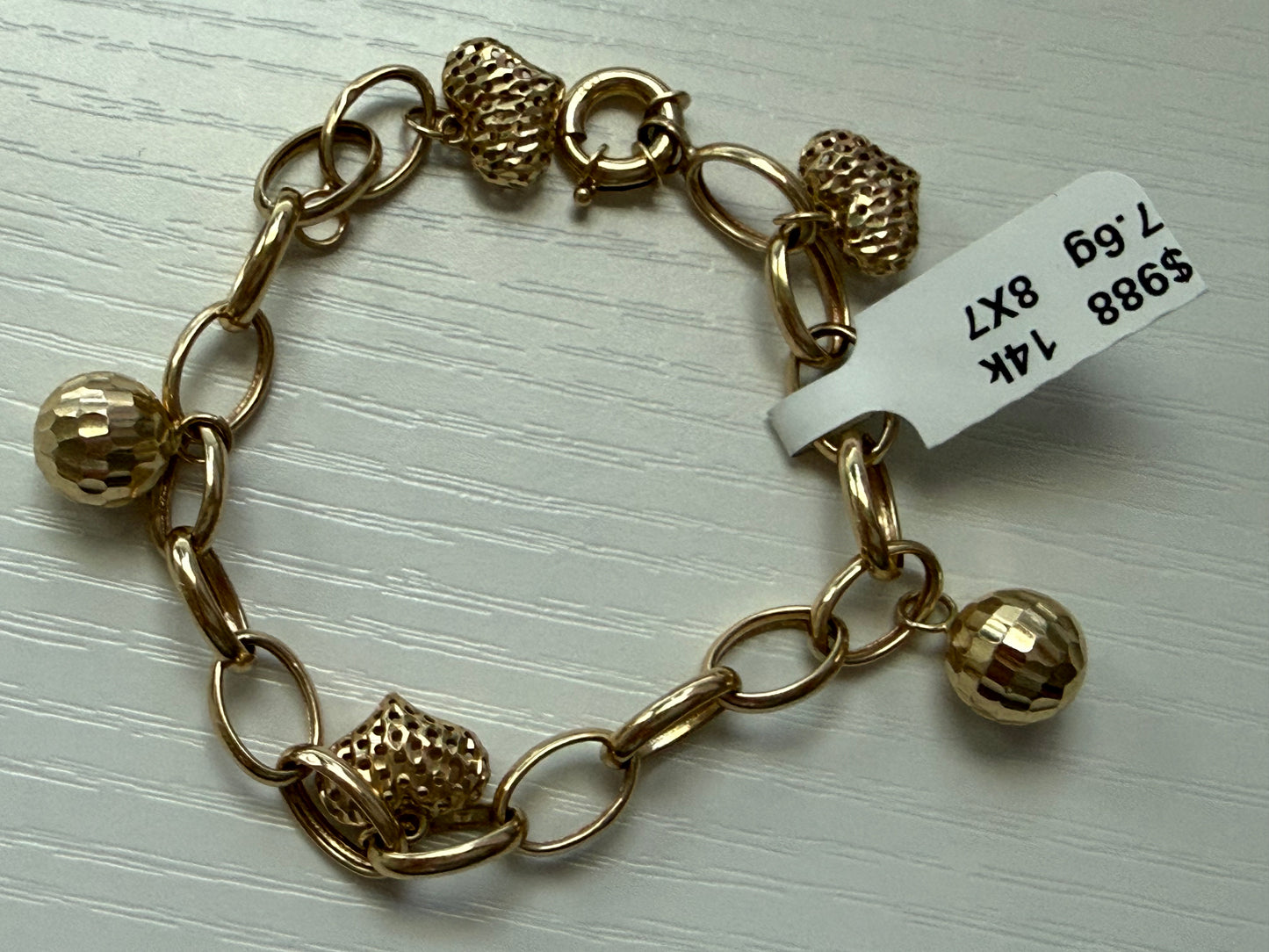 Brazalete de 14 k con colgante
